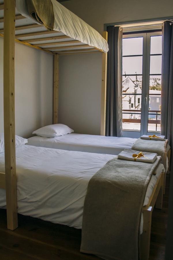 Quarto Duplo ou Twin com Casa de Banho Partilhada